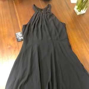 Cocktail dress. Halter and peekaboo back